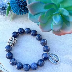 sapphire beaded bracelet with religious metal
